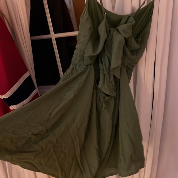 This is a mini dress. Material is very soft. Worn once. Very cute. Adjustable - Picture 3 of 3